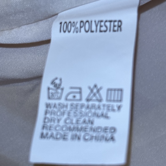 Zulily top in XXL has embossed flowers It’s  lining the sleeve are see-threw - Picture 14 of 15